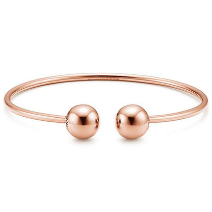 TIF19690384 11mm large light gold spherical coil open bracelet