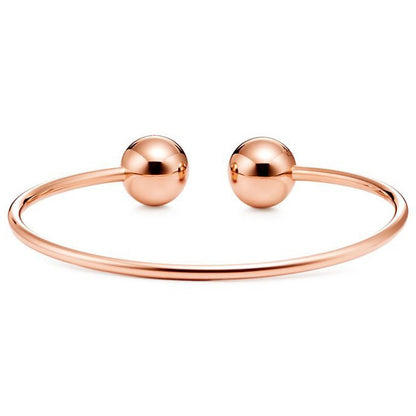 TIF19690384 11mm large light gold spherical coil open bracelet