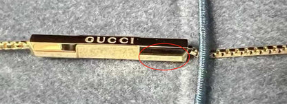 GC-662108齿纹光金异形梯臂吊坠
