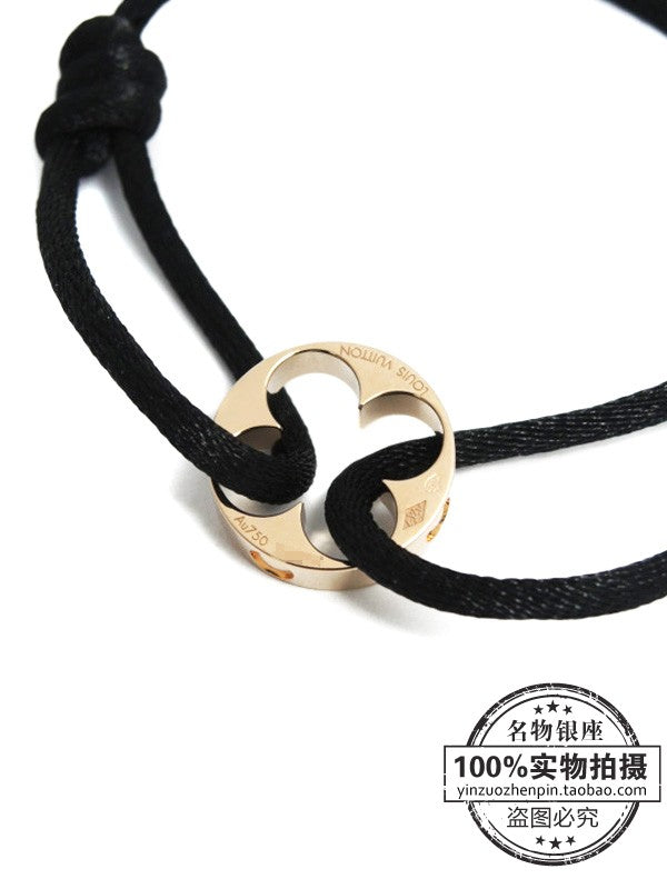 LV-Q95647路路通光金四叶草黑绳手链