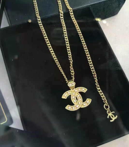 XNE-CN394908 15mm Cross High and Low Single Row Solid Bottom Double C Pendant