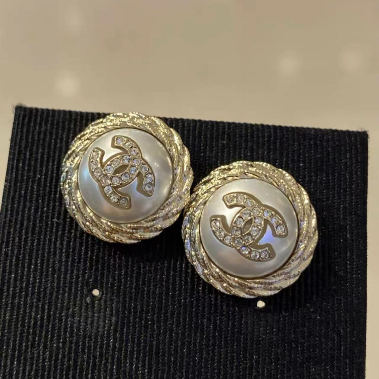 XNE-CN528896 Double C twisted rope spiral earrings