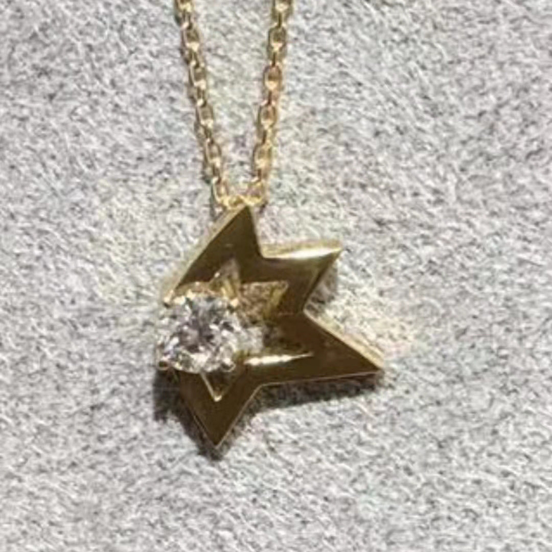 TSQ-557 Notched Star Pendant