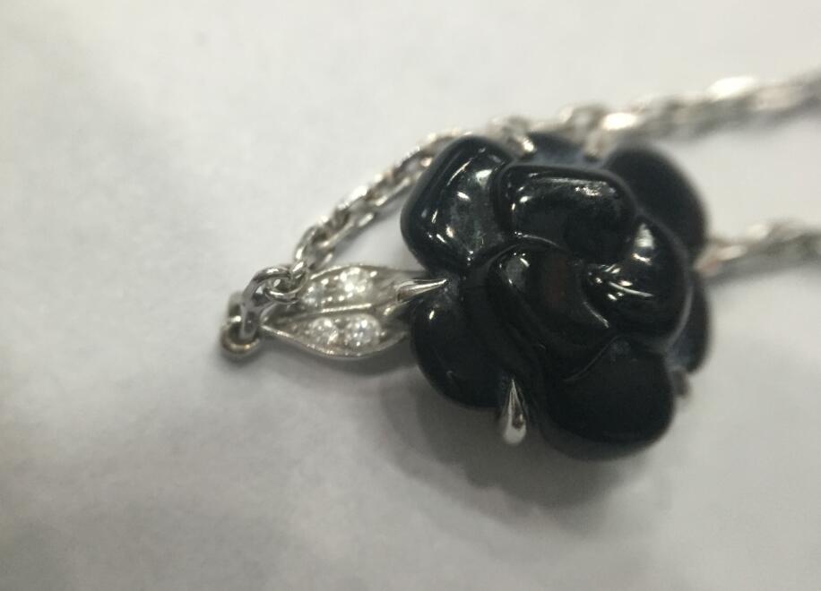 XNE-J3154黑玛瑙陶瓷花手链客版