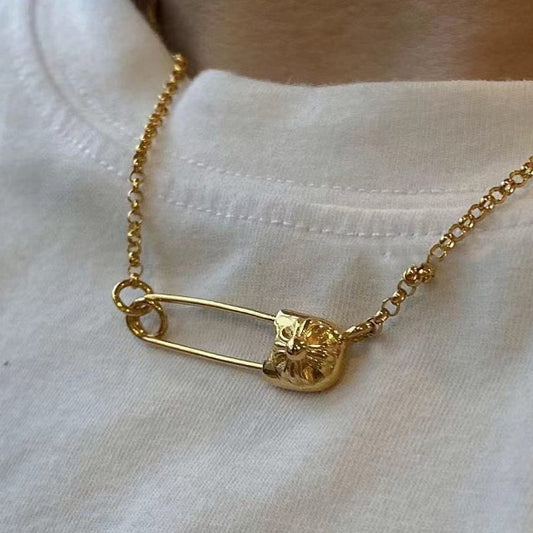 KLX-5665846 light gold cross paper clip pendant