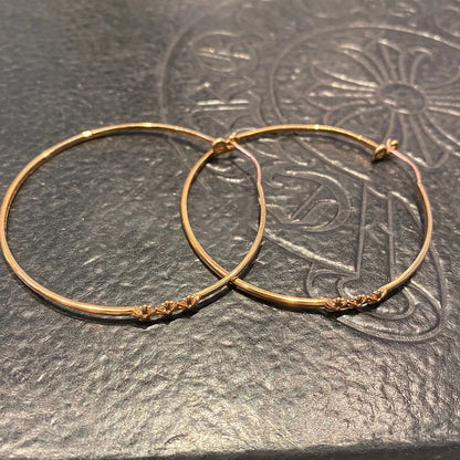 KLX-964244 light gold spear flower cross hoop earrings