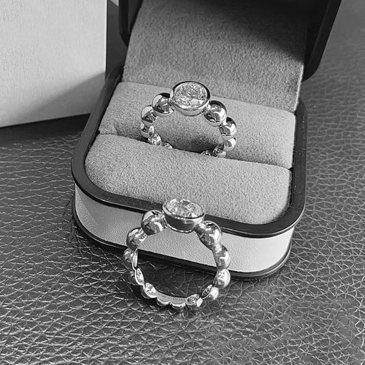 VCA1680745 bezel set ball bead ring 1ct