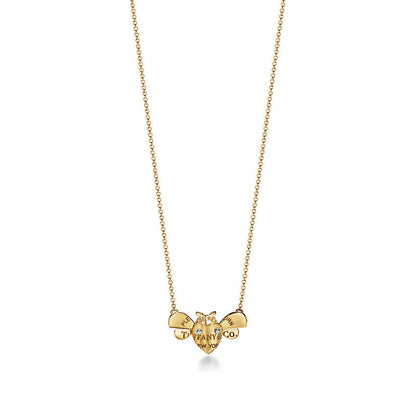 TIF5717876 letter light gold ladybug tether pendant