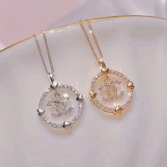 XNE-J84124 25mm Ring Double C Pendant