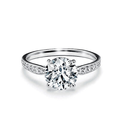 TIF72411072 Crossed four prong ring