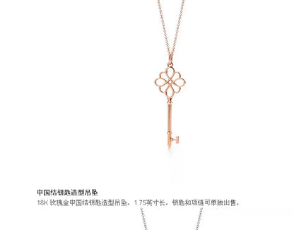 TIF33485463 light gold Chinese knot key pendant 1.75 inches