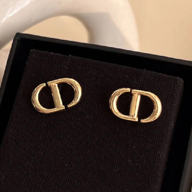 DIOR-4185462 light gold CD earrings