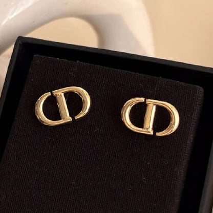 DIOR-4185462 light gold CD earrings