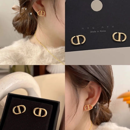 DIOR-4185462 light gold CD earrings