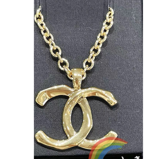XNE-Double C pendant asymmetric light gold high and low cross pendant