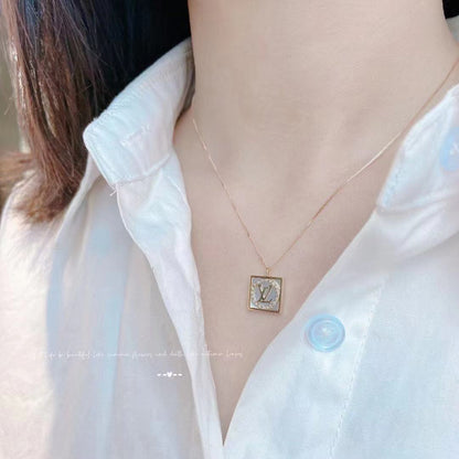 LV-Q44037 square letter LZ round stone pendant